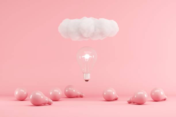 istock Lightbulb floating with cloud above pink lightbulbs on pink background. minimal creative idea concept. 3D render. 1161686273