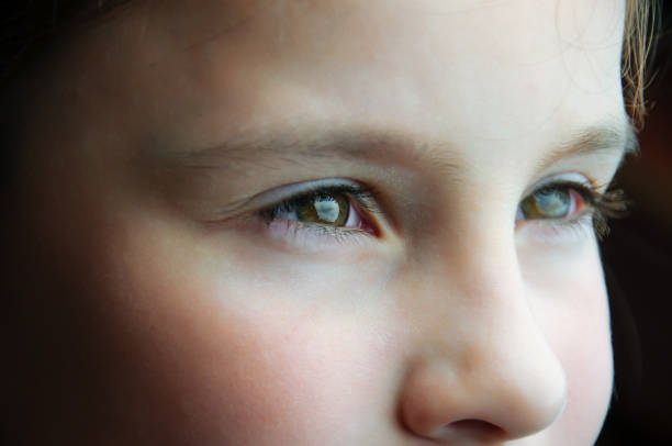 istock Close up of a young child's eyes 1161692430