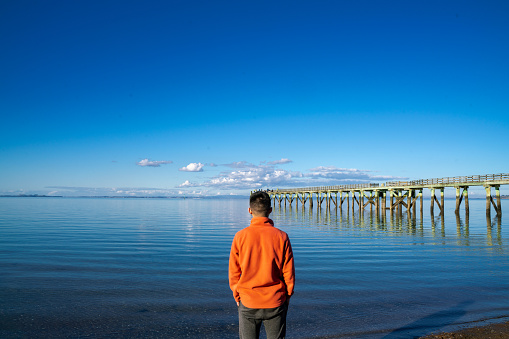 Young Asian traveling backpacker in New zealand auckland