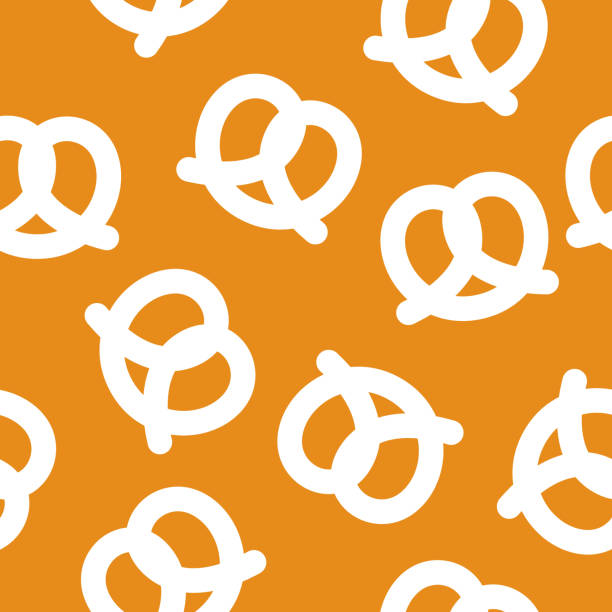 Pretzel Pattern Silhouette Vector illustration of pretzels in a repeating pattern against an orange background. pretzel stock illustrations