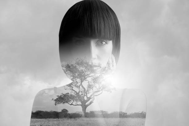 Multiple Exposure of young woman and single tree