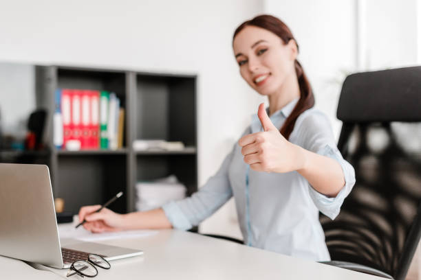 istock woman working in the office with laptop 1161707716