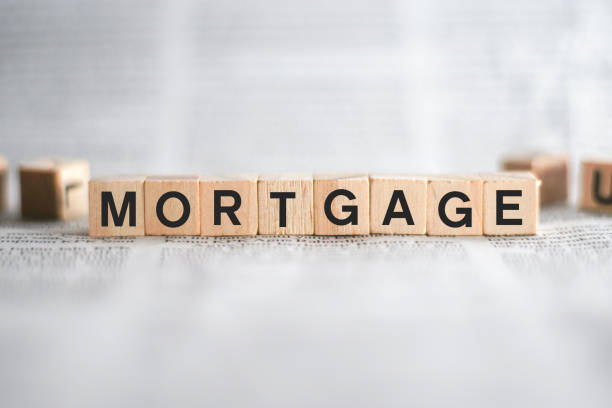 Mortgage Word Written In Wooden Cube stock photo
