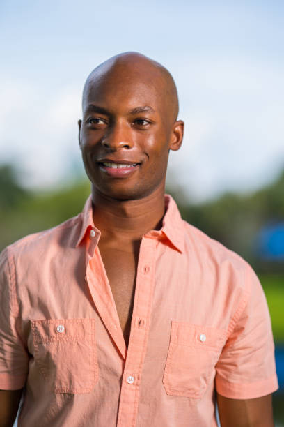 istock Handsome African American man smiling off camera 1161713185