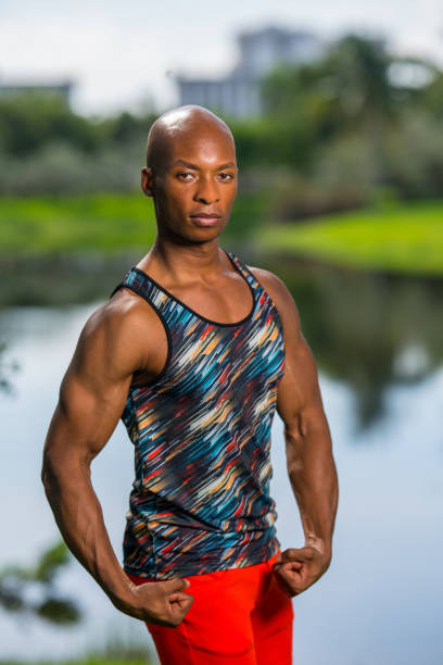 istock Portrait of an attractive man flexing his arms 1161717199