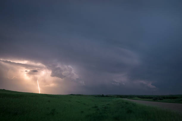 istock Lightning from a supercell thunderstorm over the northern plains, USA during blue hour. 1161717672