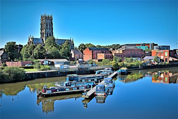 Blue sky reflections from st George's Bridge, Doncaster, South Yorkshire, England Capturing fascinating symmetrical reflections on a warm summer's blue sky day, from a helpful vantage point. reflection lake stock pictures, royalty-free photos & images