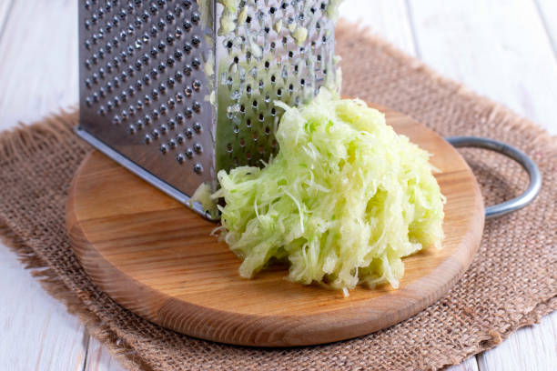 istock Grated zucchini with grater 1161719415