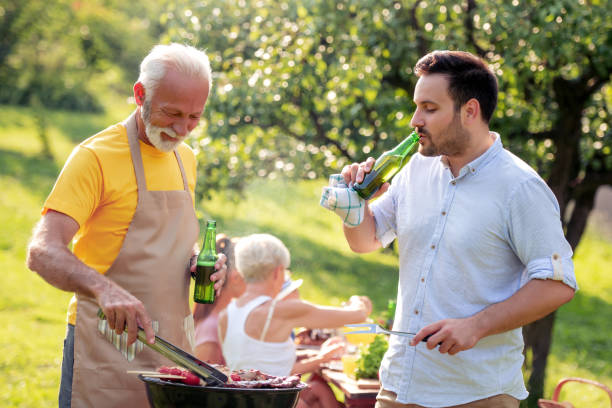 istock Family having lunch in nature 1161719576