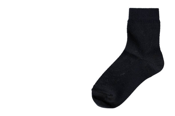 istock Black cotton sock, foot clothing. Isolated on white 1161723171