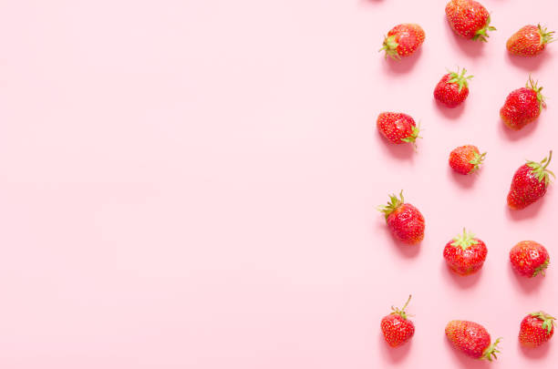 istock Strawberry on pink background. Flat lay, top view. Copy space.- Image 1161727839