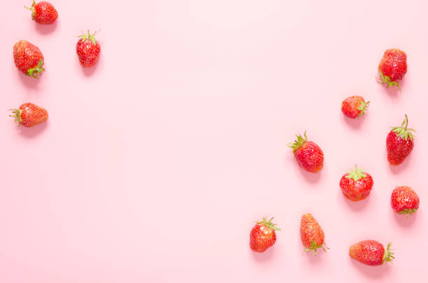 istock Strawberry on pink background. Flat lay, top view. Copy space.- Image 1161727844