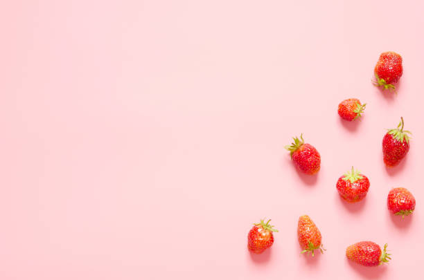 istock Strawberry on pink background. Flat lay, top view. Copy space.- Image 1161727861