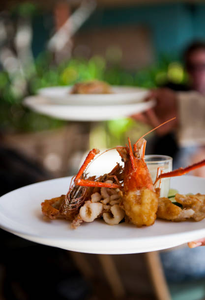 istock Waiter serving lobster in the restaurant 1161728081