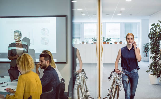 istock Businesswoman Arriving to a Work, Using Phone 1161728999