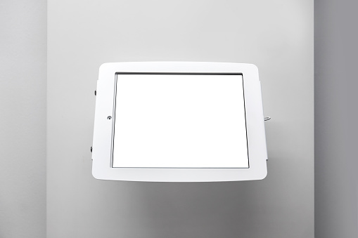 blank tablet information display on wall