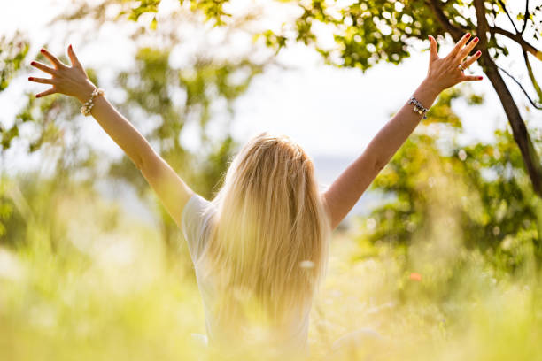 istock Rear view young women enjoying in nature 1161729743