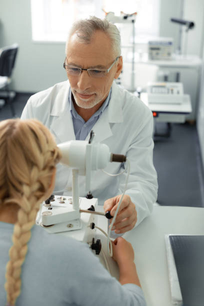istock Blonde-haired girl visiting eye doctor feeling good 1161733431