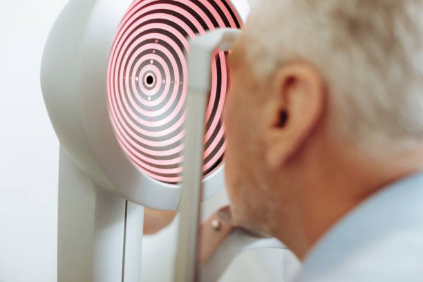 istock Modern equipment for eye sight analysis standing in light room 1161733553