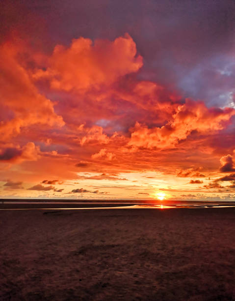 istock Beautiful sky colorful sunset on the beach 1161735137
