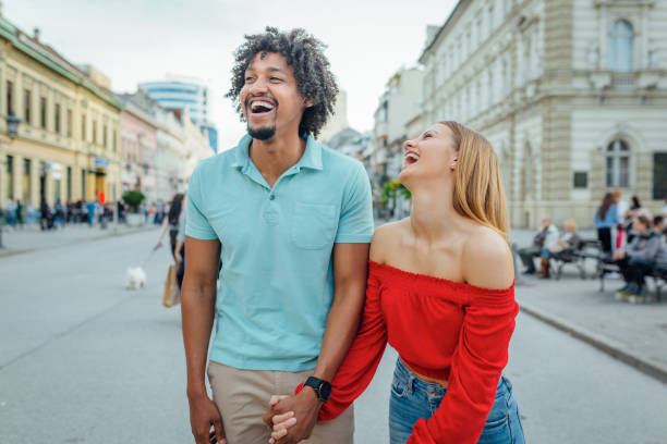 istock Multi-ethnic couple wallllking in the city 1161736843