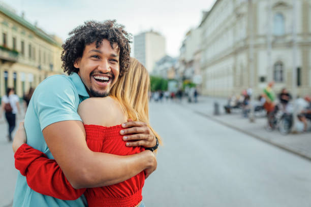 istock Man and woman hugging 1161737549