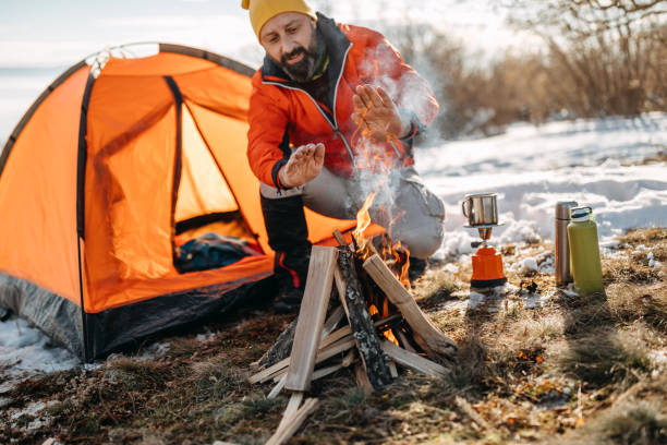 istock Man preparing food on mountain 1161739977