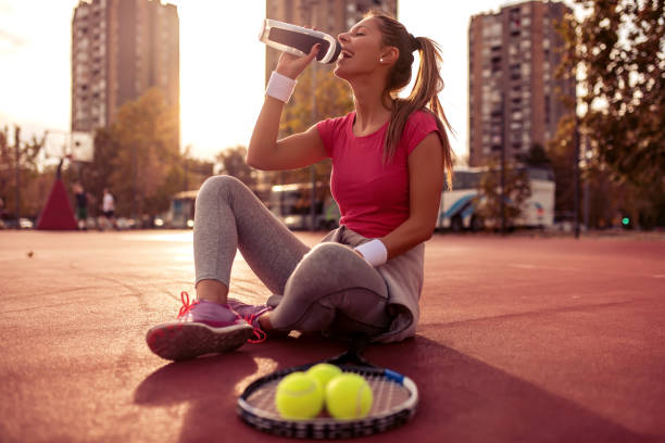 istock Woman playing tennis 1161742144