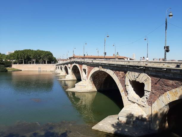 The garonne river and the Pont Neuf in Toulouse, France stock photo