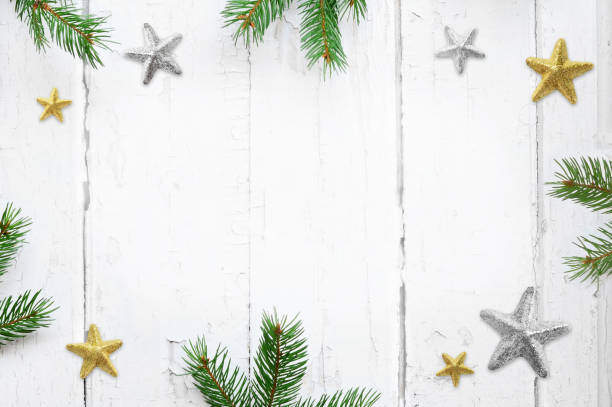 istock Fir branch with Christmas decorations on old wooden shabby background with copy space for text. 1161743913