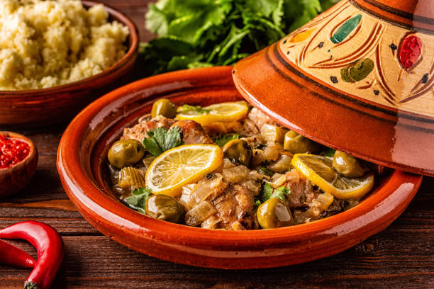 Traditional Moroccan chicken tagine with olives and salted lemons stock photo