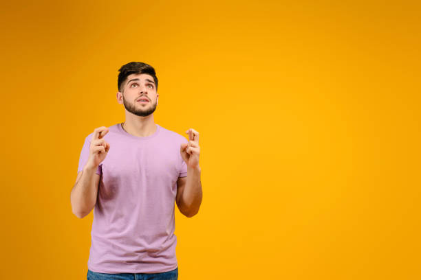 istock Young man isolated over bright yellow background 1161750055