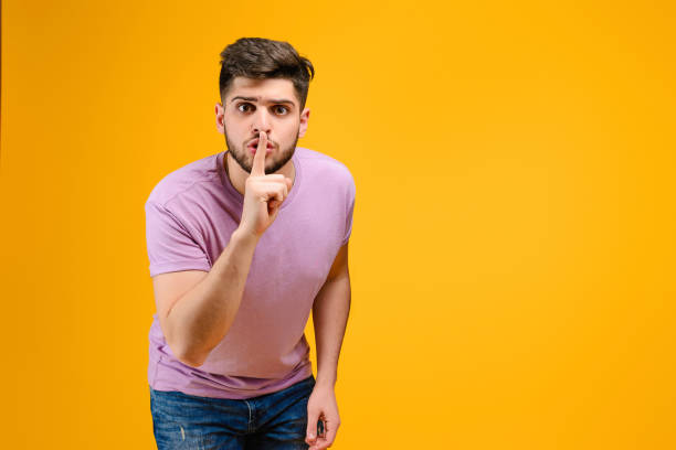 istock Young man isolated over bright yellow background 1161750135