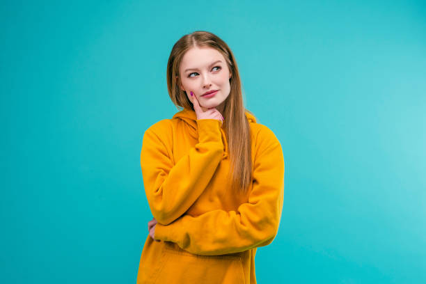 istock Young woman isolated over turquoise background 1161750172