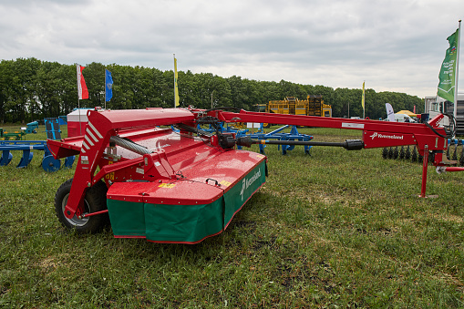 Goryainovka, Mordovia, Russia - June 28, 2019: The Kverneland 4332 LR trailed mower conditioner at the public event Russian Plowing Championship.