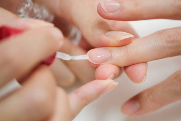 istock Closeup of painting fingernails 1161752817