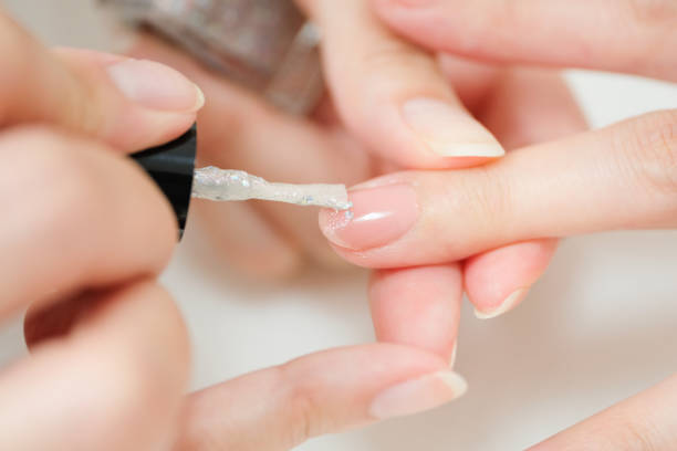 istock Closeup of painted fingernails 1161753773