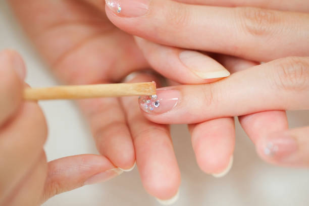 istock Nail stylist decorating fingernail 1161753895
