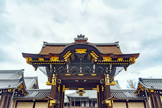 Kyoto, Kyoto, Japan - November 14 2018 : Amidado-mon gate of Nishi Hongan-ji Temple. Established in its current location in 1591, the origin of the temple goes back to the 14th century.
