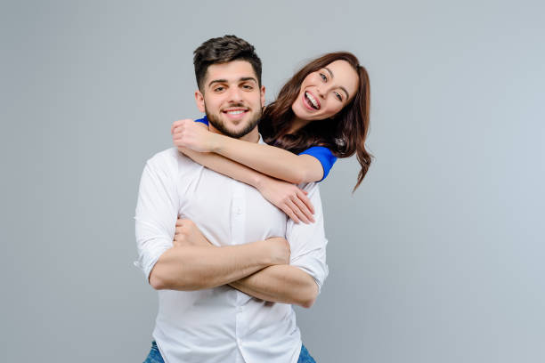 istock young man and woman isolated 1161755603