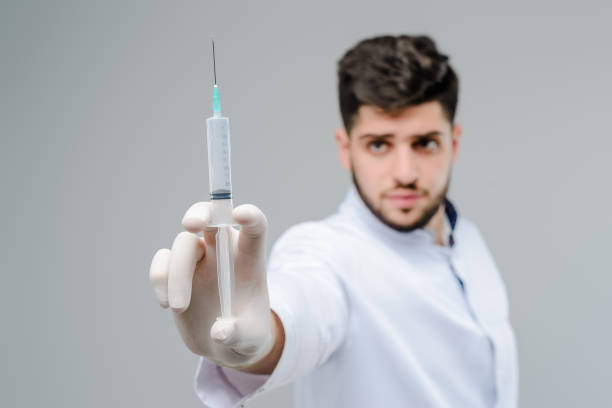 istock middle eastern medical doctor isolated over grey 1161755792