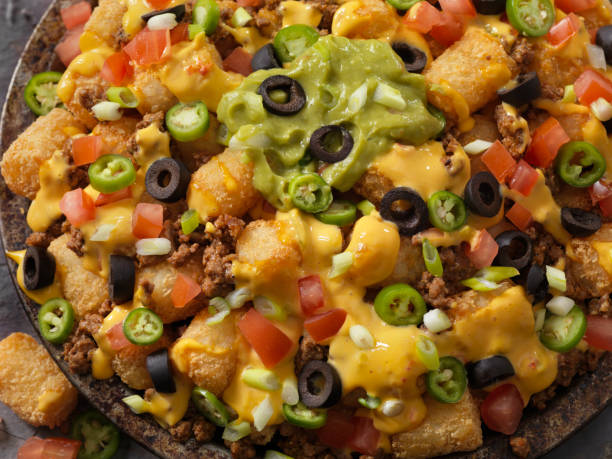 istock Crispy Tator Tot Hash Brown Nachos (Tatchos) 1161759115
