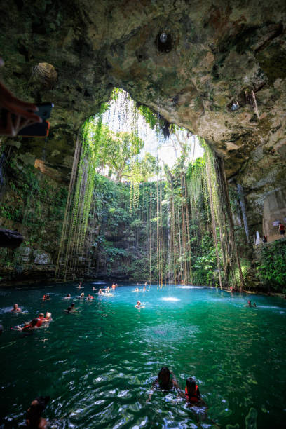 Amazing Ik-Kil Cenote near Chichen Itza, Mexico ik-Kil Cenote near Chichen Itza, Mexico cenote stock pictures, royalty-free photos & images