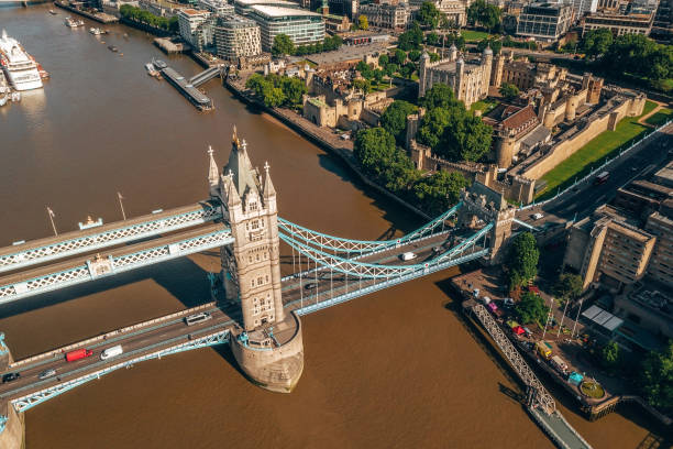 Arial view of London with the River Thames Arial view of London with the River Thames near Tower Bridge, the Shard and Canary Wharf district at sunrise. big ben stock pictures, royalty-free photos & images