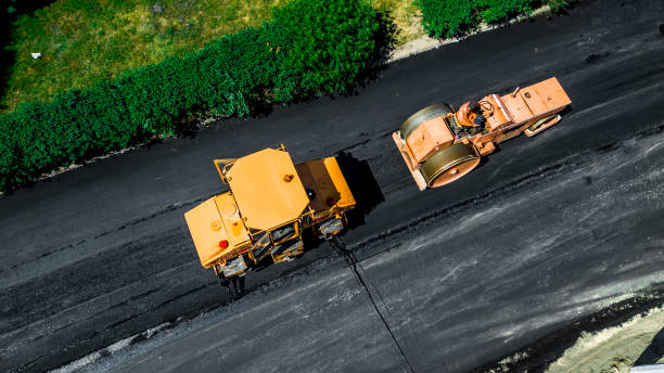 istock Aerial view on the new asphalt road under construction 1161764572