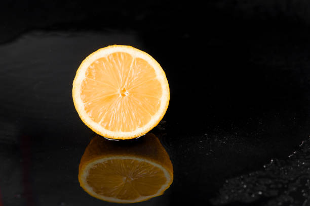 istock Grapefruit with water drops on black background. Citrus fruit. Healthy freshness food. fruit with vitamin 1161764603