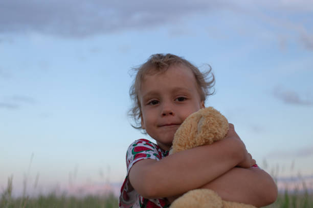 Boy with toy in nature