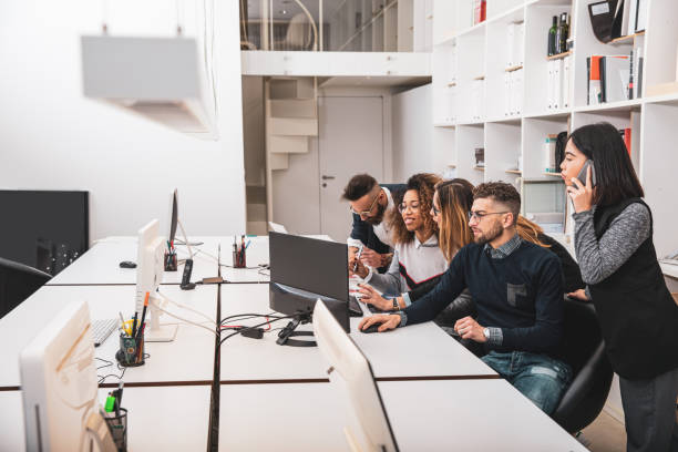istock Business in the office, young Team working in a shared studio 1161773119