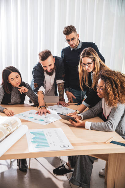 istock New and young business working in a studio loft 1161773240