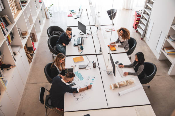 istock Business in the office, young Team working in a shared loft 1161775085